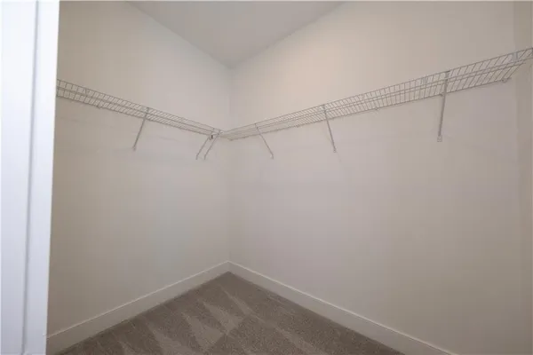 a view of a room with racks on the wall