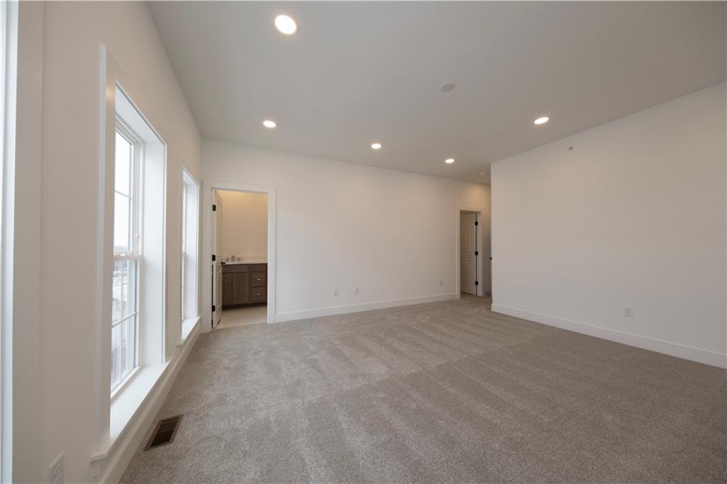 405 Ramsgate Road Cranberry Township, PA 16066 - Photo 41 of 50 an empty room with a natural light