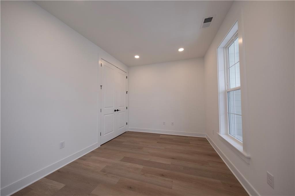 405 Ramsgate Road Cranberry Township, PA 16066 - Photo 6 of 50 wooden floor in an empty room with a window
