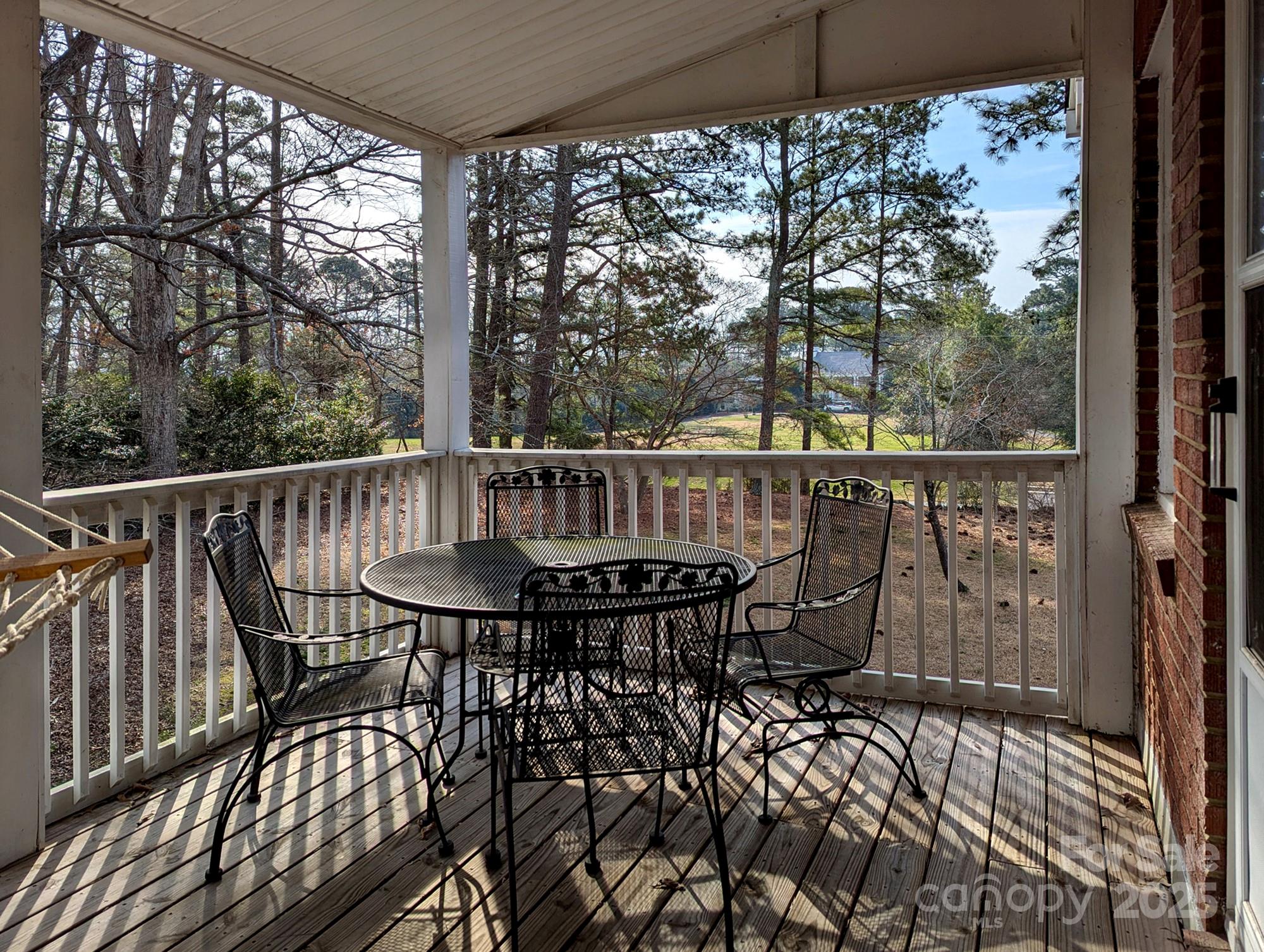 215 Biscoe Road Troy, NC 27371 - Photo 24 of 33 a view of a chairs and table in the balcony