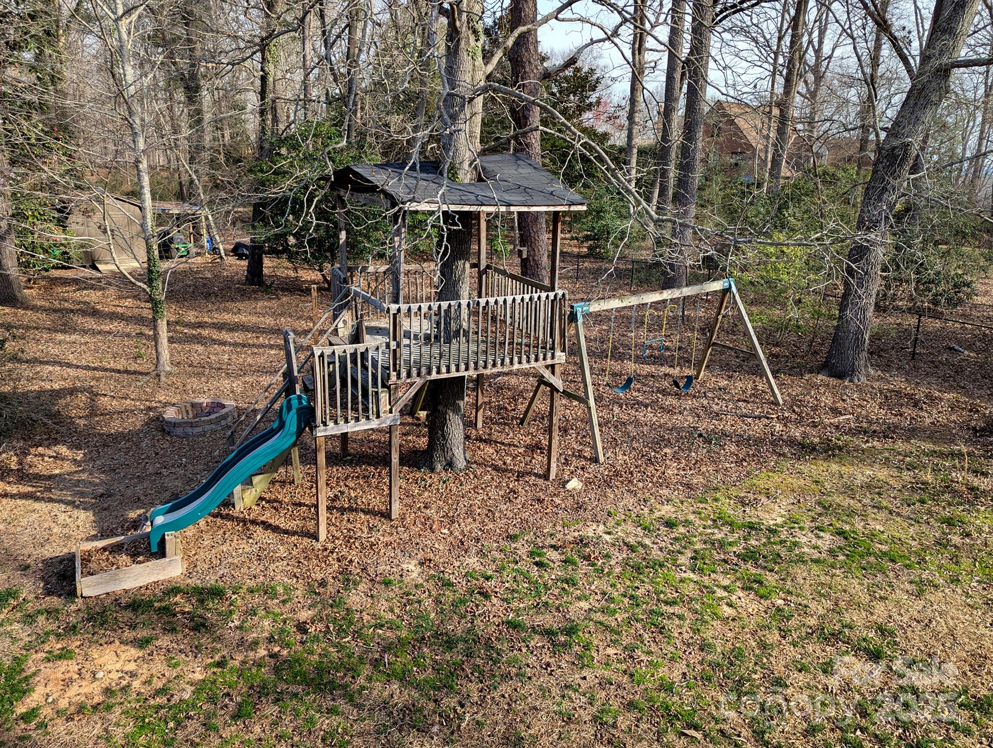 215 Biscoe Road Troy, NC 27371 - Photo 29 of 33 a patio with table and chairs