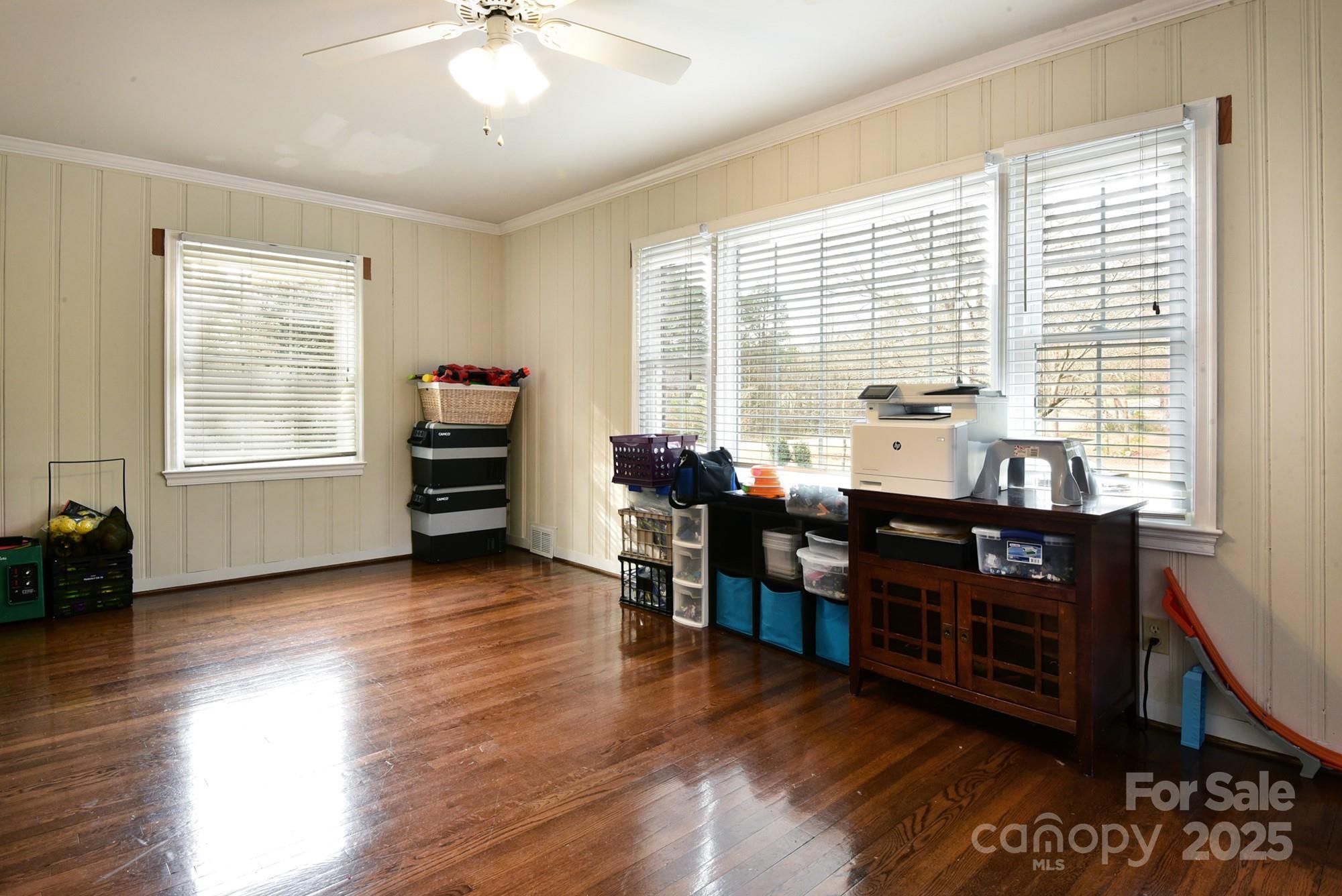 215 Biscoe Road Troy, NC 27371 - Photo 9 of 33 a view of a dining room with furniture and wooden floor