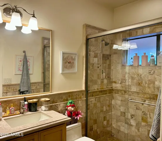 a view of a swimming pool and lounge chair