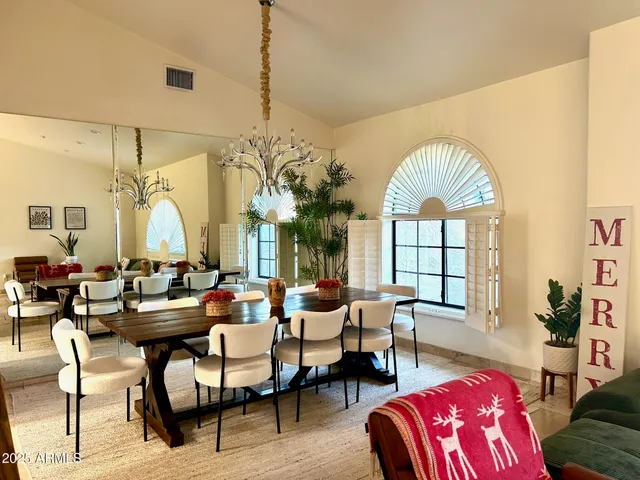 a kitchen with a sink and a stove next to a window