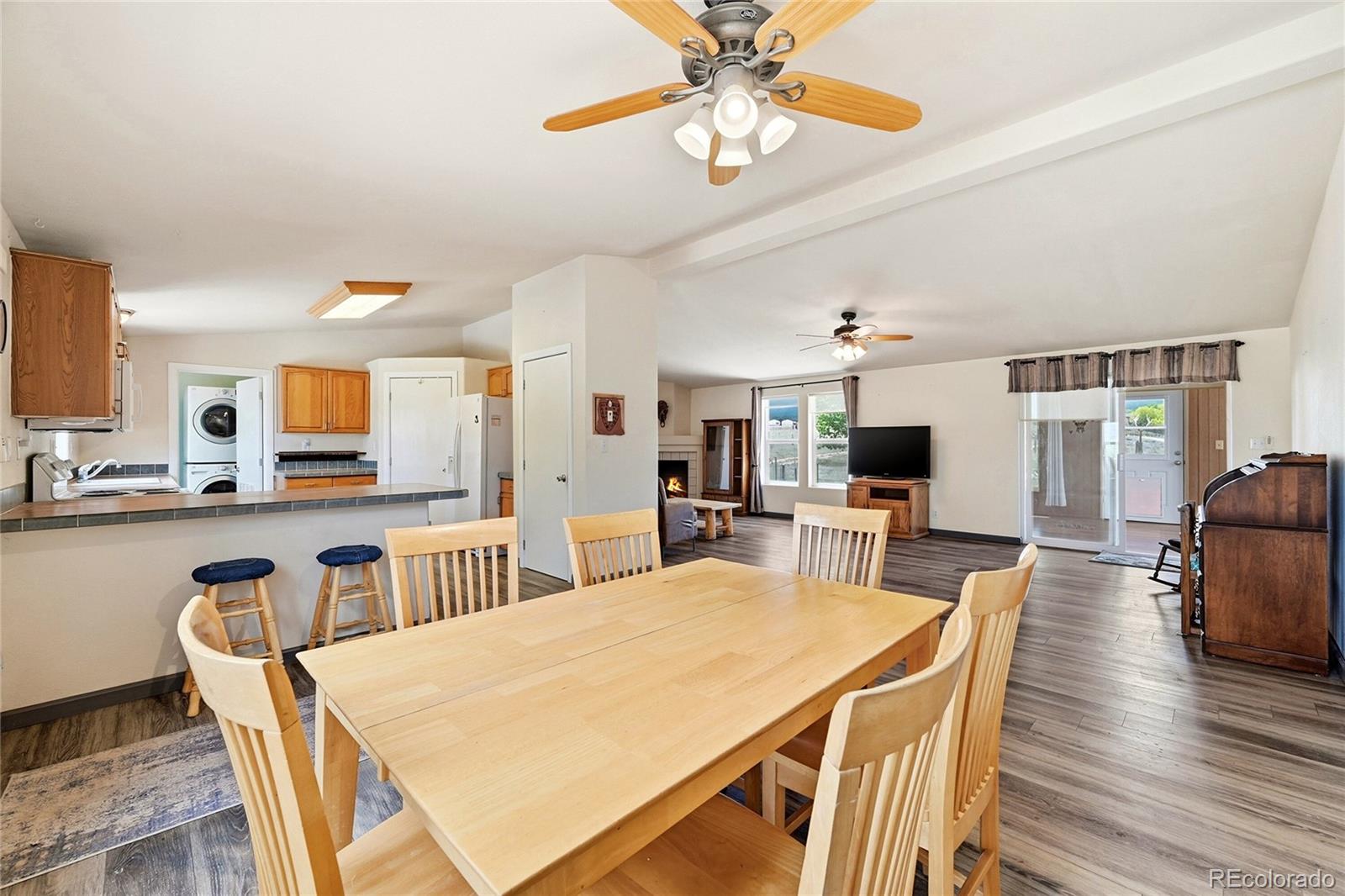 20300 Old Ranch Loop Nathrop, CO 81236 - Photo 9 of 35 a view of a dining room with furniture and wooden floor
