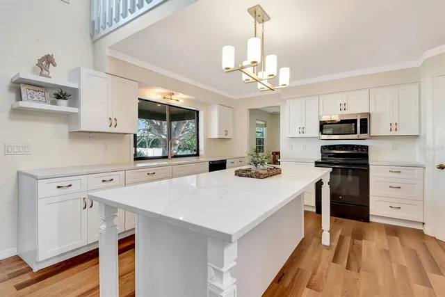 a front view of a house with a garage