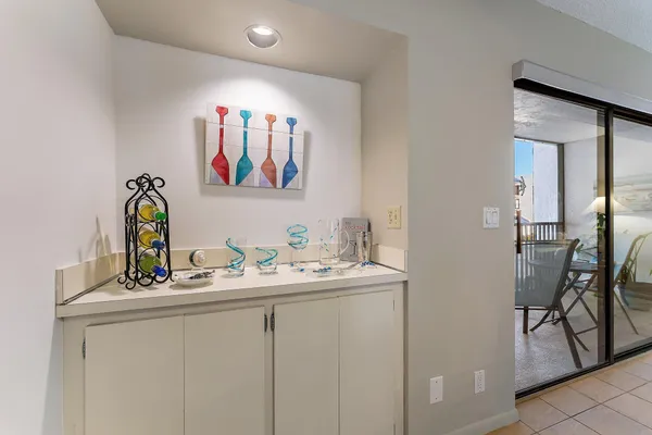 a bathroom with a sink a mirror and a window