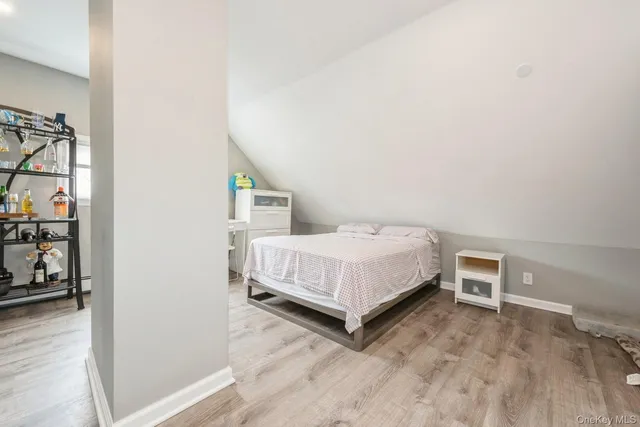 a bedroom with a bed and a closet