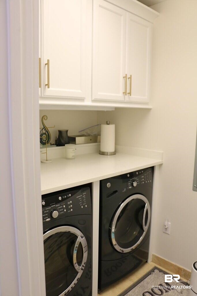 18269 Colony Drive, Unit 803 Fairhope, AL 36532 - Photo 12 of 27 Laundry room with separate washer and dryer and cabinet space
