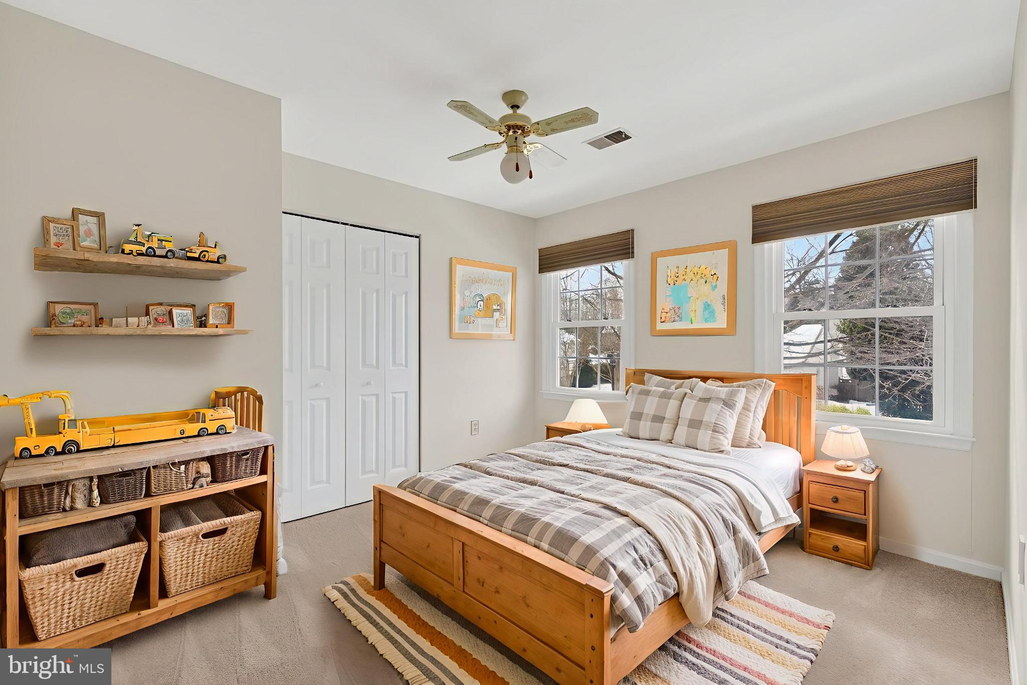 8836 Shadowlake Way Springfield, VA 22153 - Photo 18 of 77 a bedroom with a bed and a window