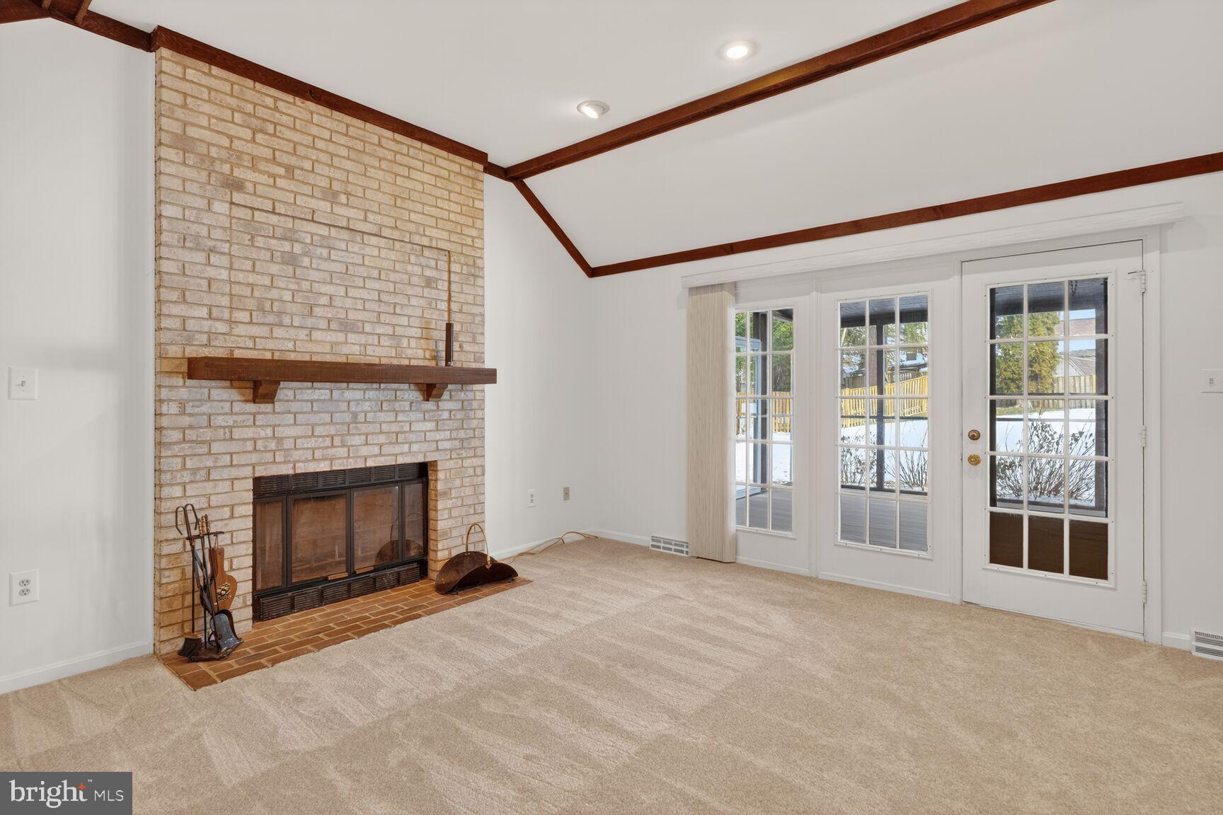 8836 Shadowlake Way Springfield, VA 22153 - Photo 37 of 77 Bright, airy great room with brick fireplace.