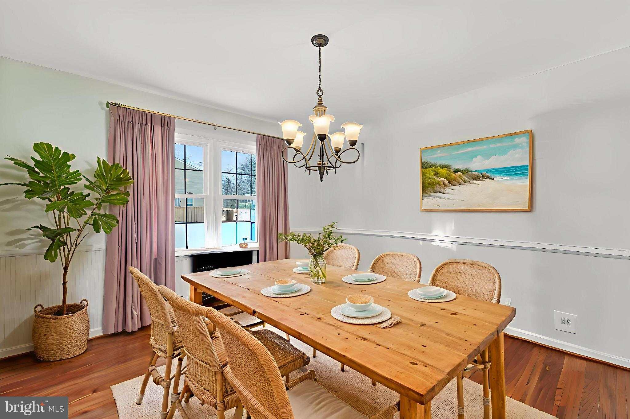 8836 Shadowlake Way Springfield, VA 22153 - Photo 4 of 77 a view of a dining room with furniture window and wooden floor