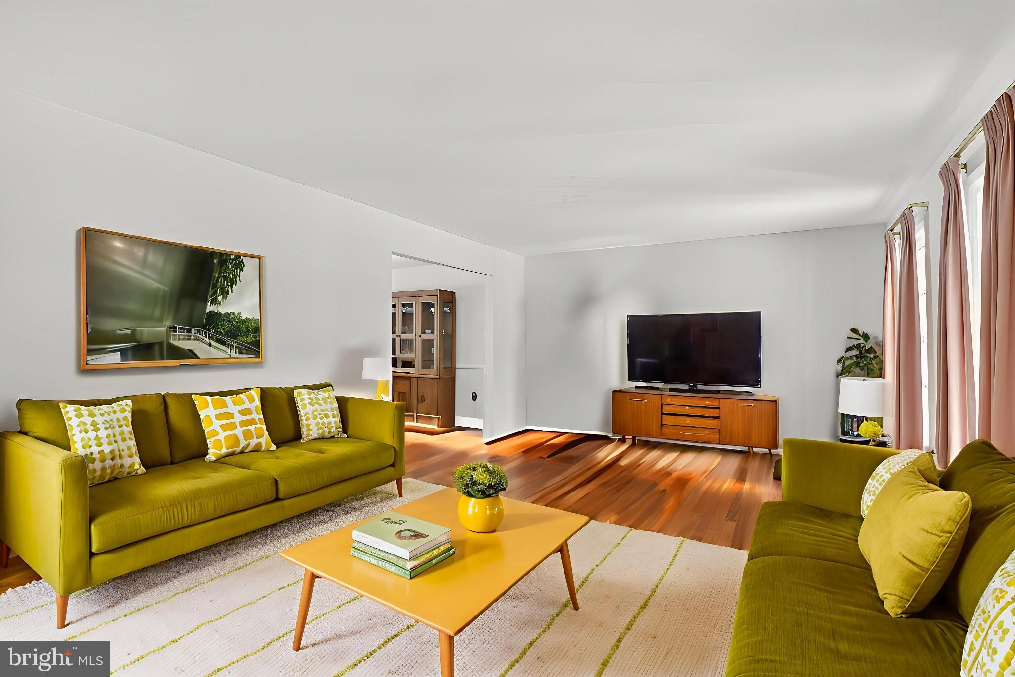 8836 Shadowlake Way Springfield, VA 22153 - Photo 67 of 77 a living room with furniture and a flat screen tv