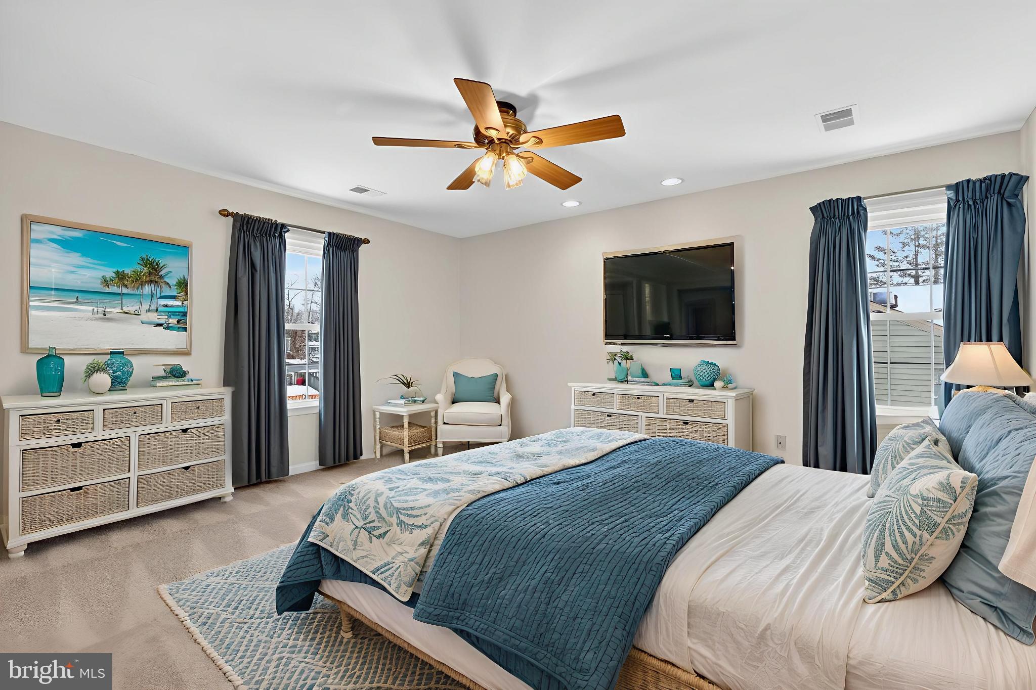 8836 Shadowlake Way Springfield, VA 22153 - Photo 70 of 77 a bedroom with a bed and a flat screen tv