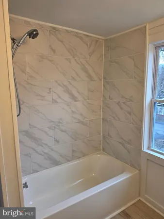 a bathroom with a bathtub