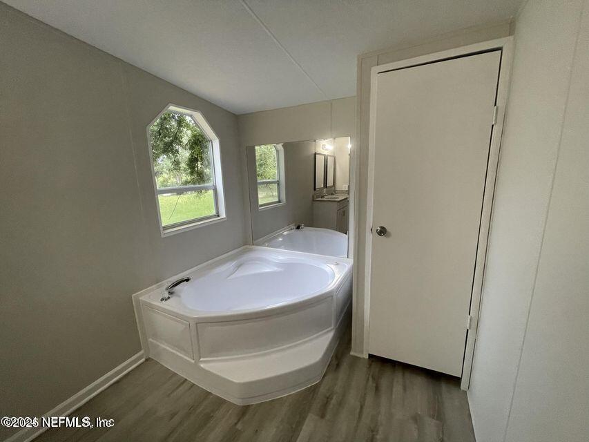 67089 Elnora Lane Yulee, FL 32097 - Photo 12 of 19 a bathroom with a sink and a mirror