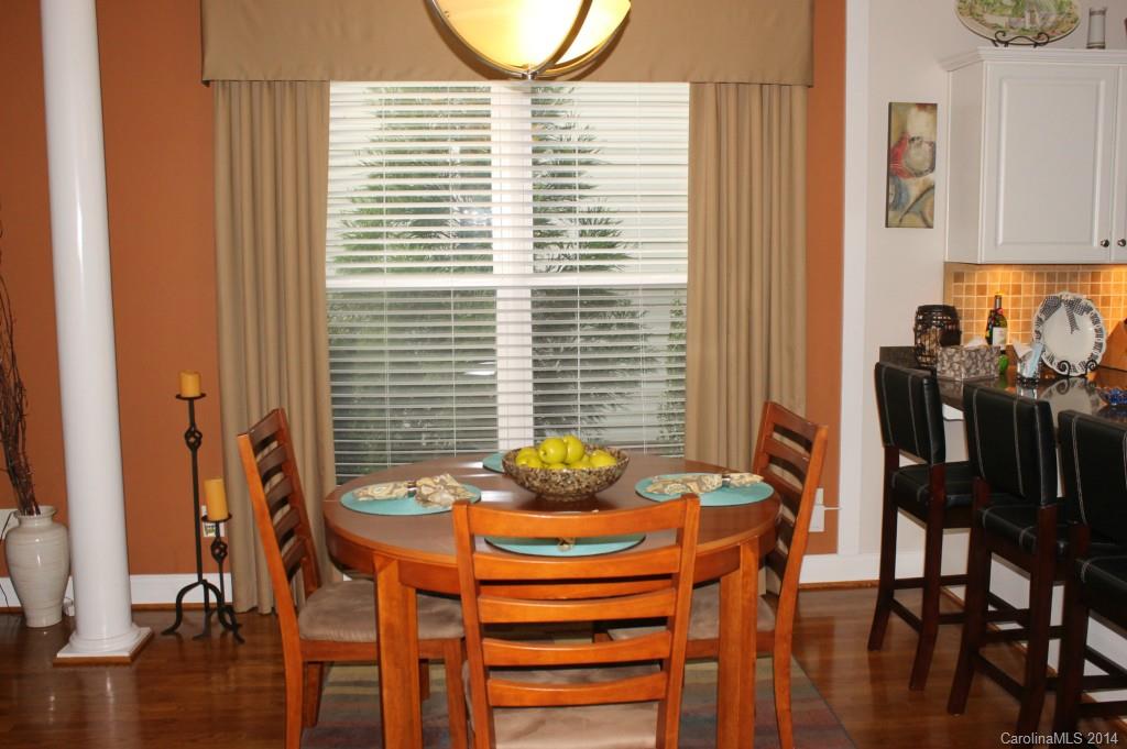 8135 Townley Road Huntersville, NC 28078 - Photo 6 of 21 a dining room with furniture and window