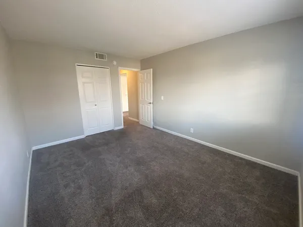 a view of an empty room and window