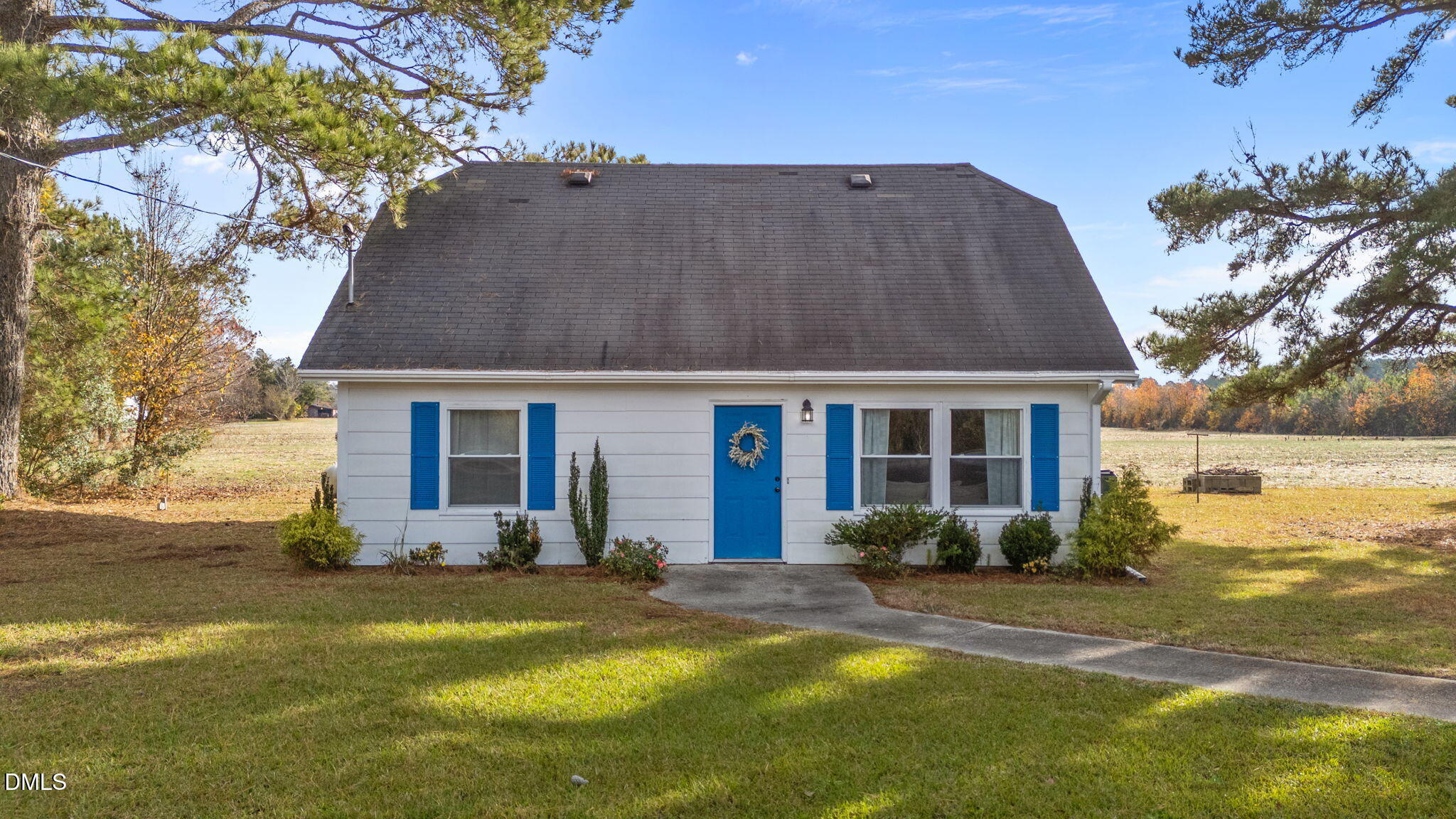 2874 Beulahtown Road Kenly, NC 27542 - Photo 1 of 40 a front view of house with yard and outdoor seating