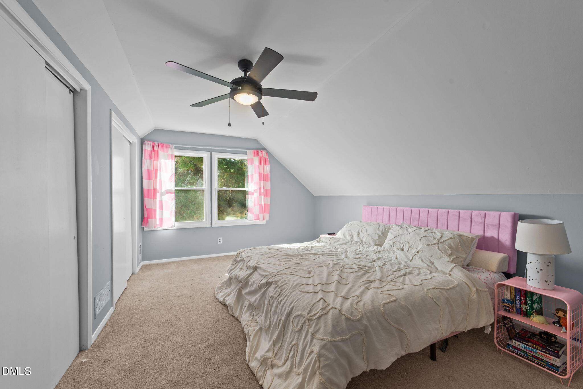 2874 Beulahtown Road Kenly, NC 27542 - Photo 19 of 40 a bedroom with a bed and a window