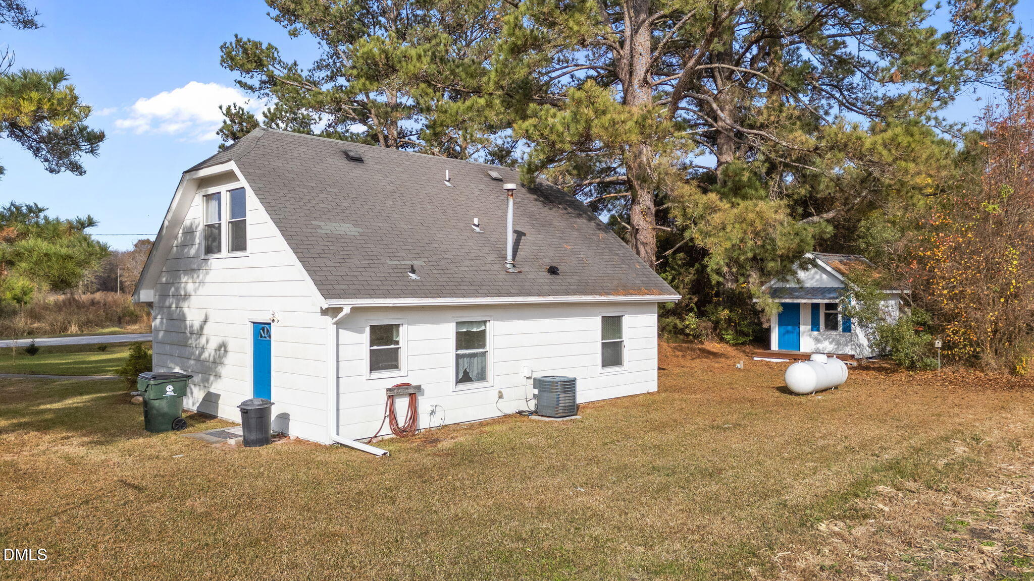 2874 Beulahtown Road Kenly, NC 27542 - Photo 29 of 40 a view of a house with a backyard