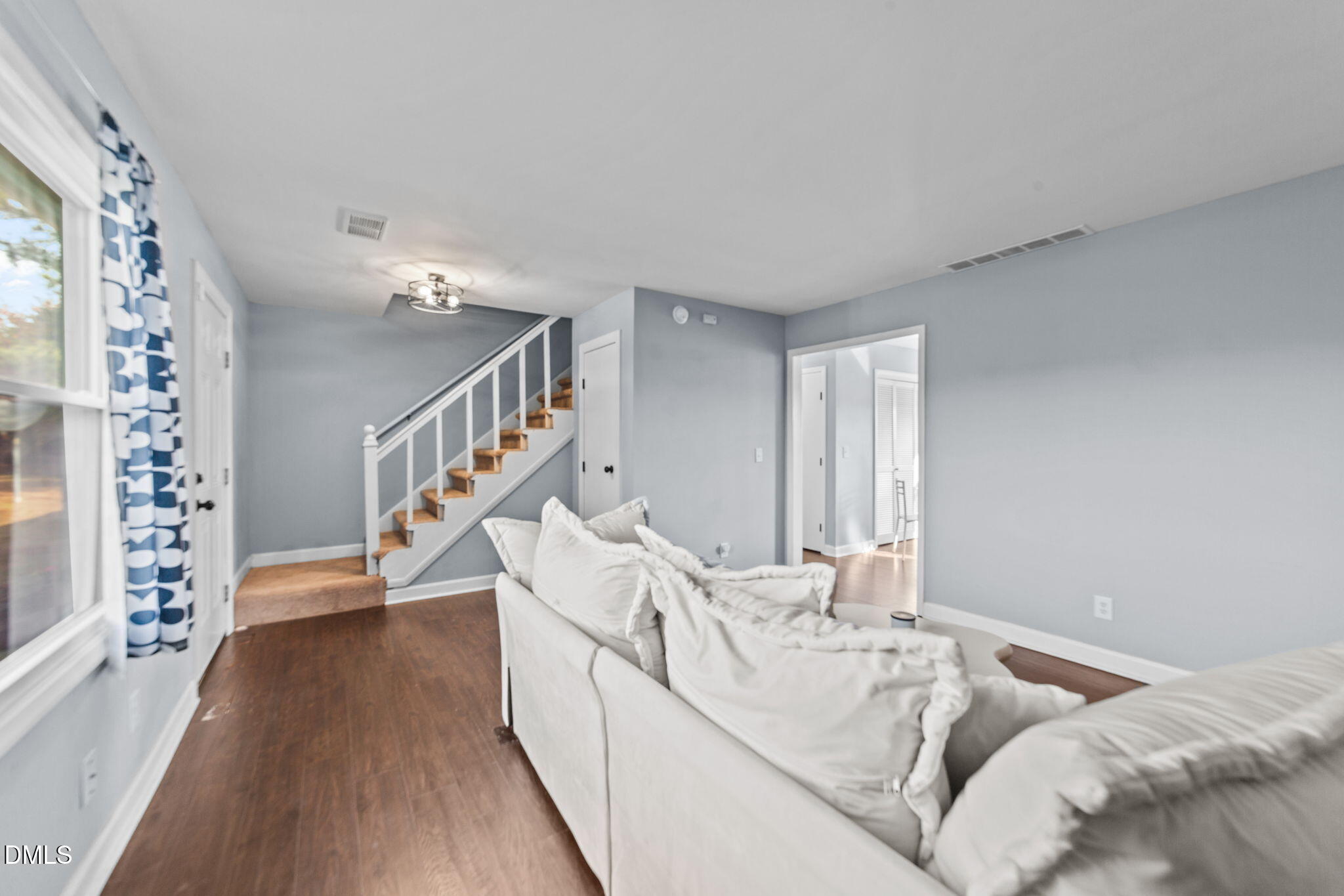 2874 Beulahtown Road Kenly, NC 27542 - Photo 5 of 40 a living room with furniture and stairs