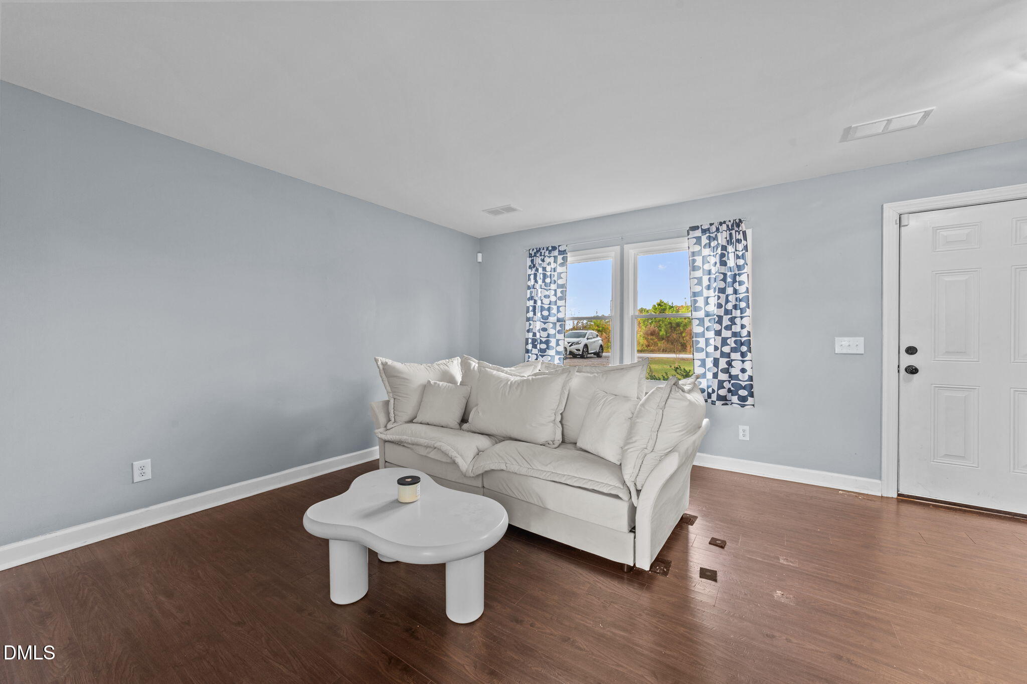 2874 Beulahtown Road Kenly, NC 27542 - Photo 7 of 40 a living room with furniture and a wooden floor