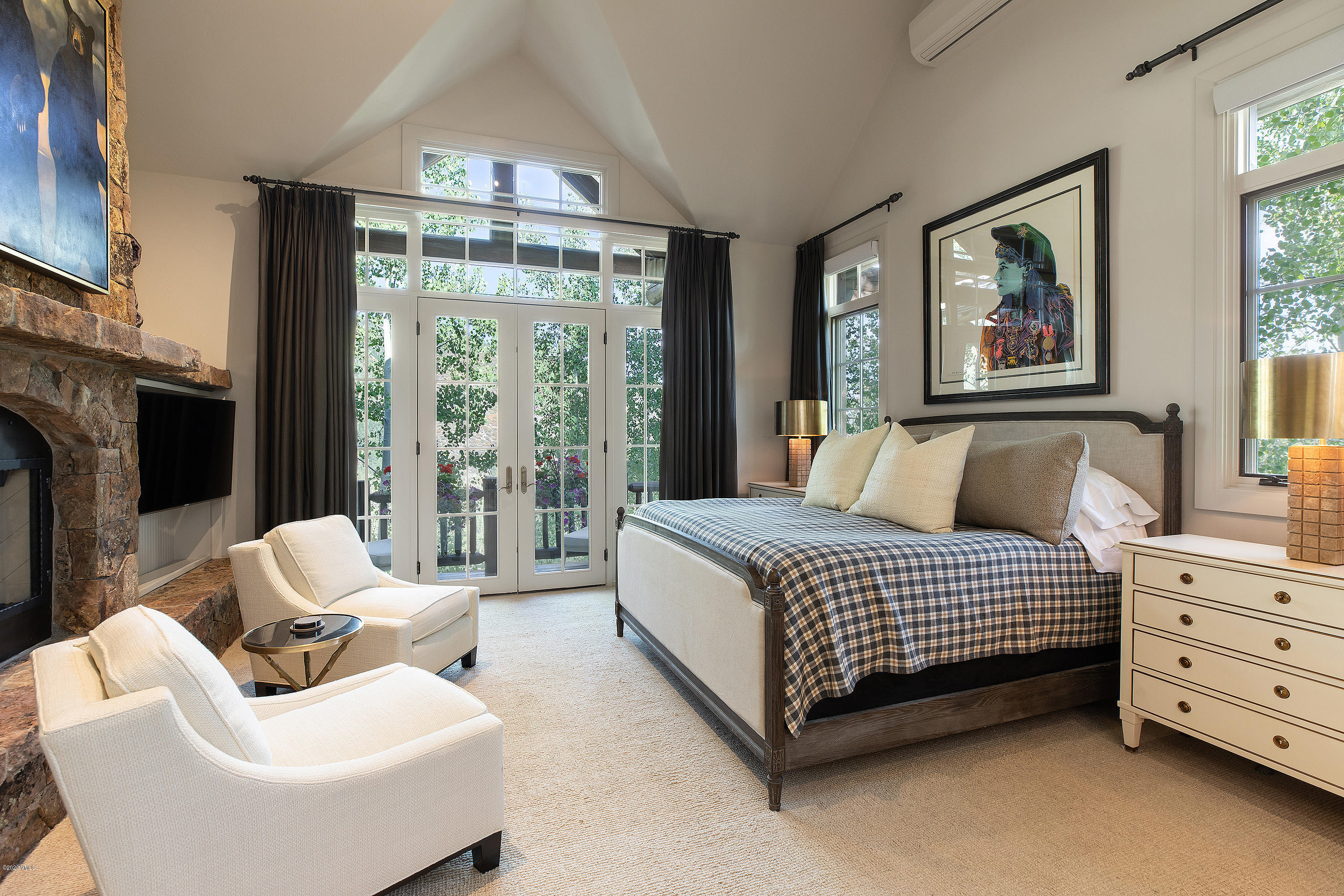 2178 Cresta Road Edwards, CO 81632 - Photo 11 of 15 a spacious bedroom with a bed and glass window