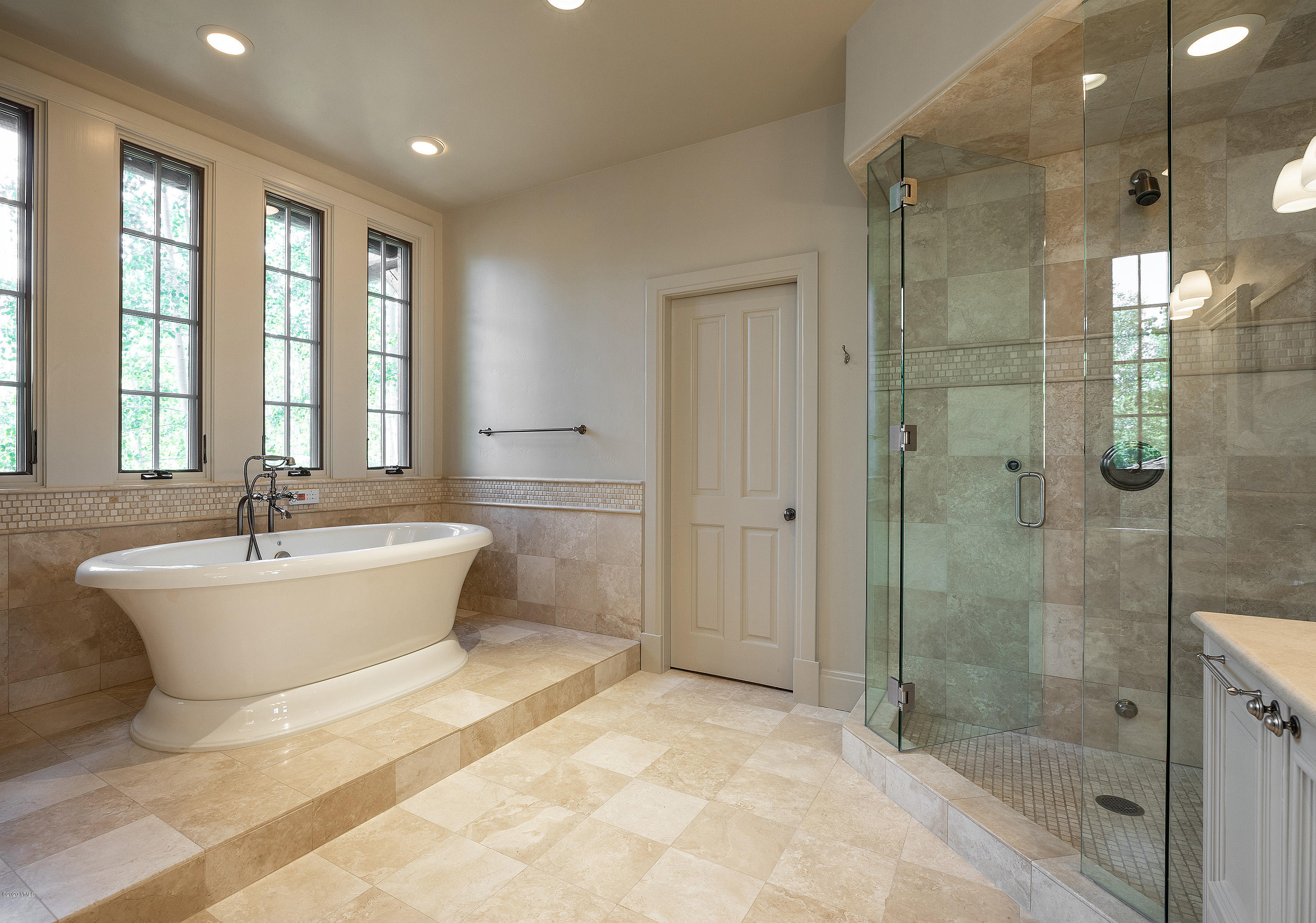 2178 Cresta Road Edwards, CO 81632 - Photo 12 of 15 a spacious bathroom with a bathtub and shower