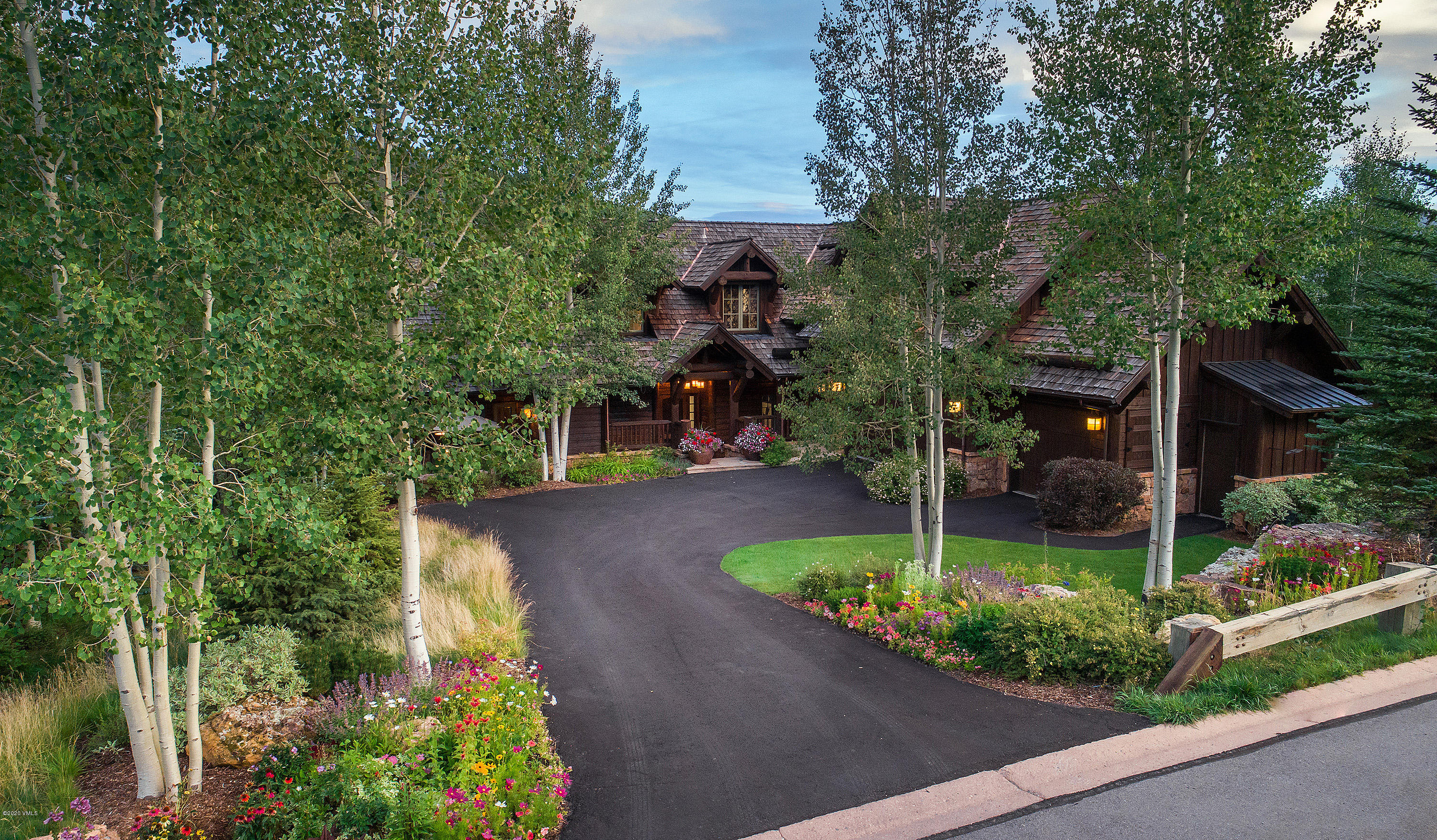 2178 Cresta Road Edwards, CO 81632 - Photo 15 of 15 a view of a garden with a building in the background