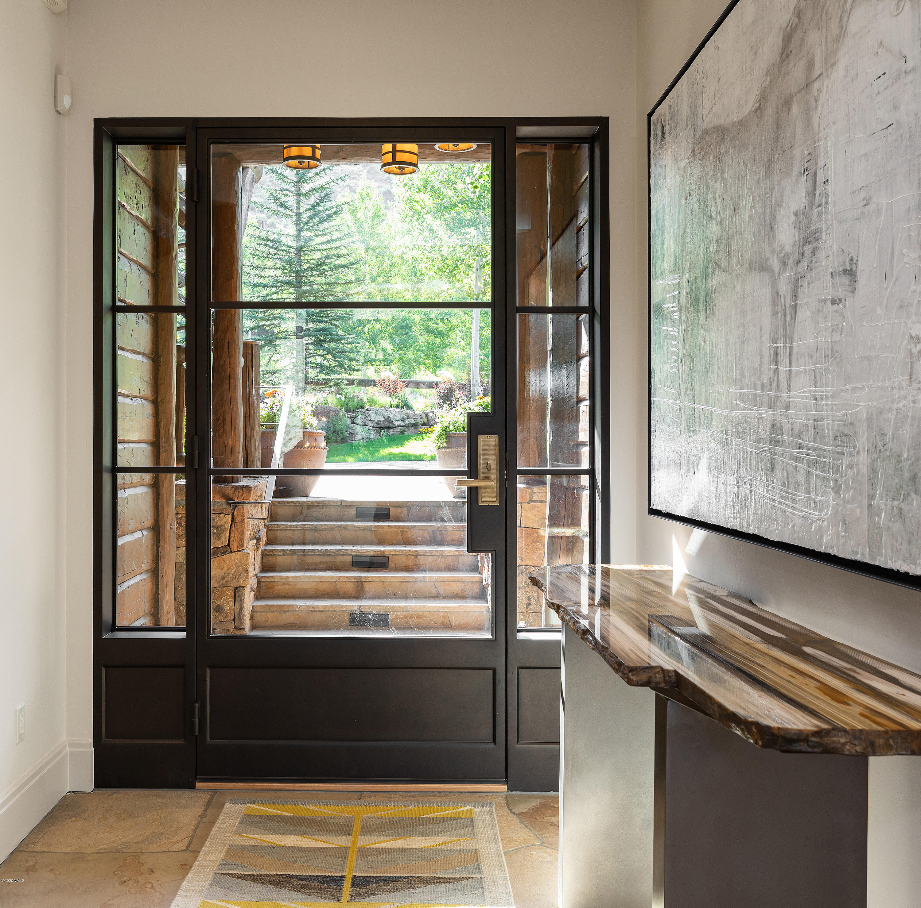 2178 Cresta Road Edwards, CO 81632 - Photo 5 of 15 a view of a living room with a large window