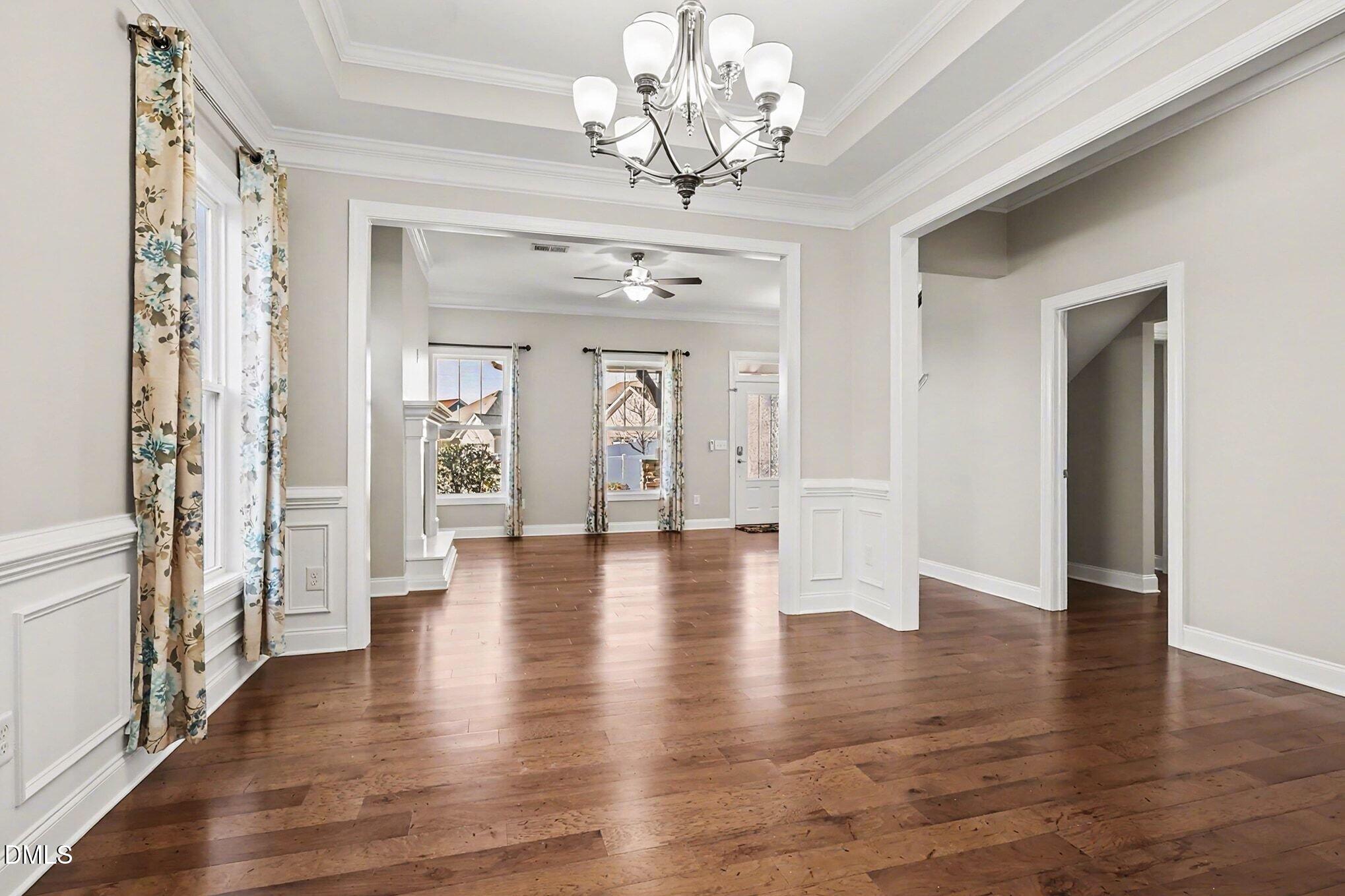 1213 Hemby Ridge Lane Morrisville, NC 27560 - Photo 13 of 60 a view of an entryway with wooden floor