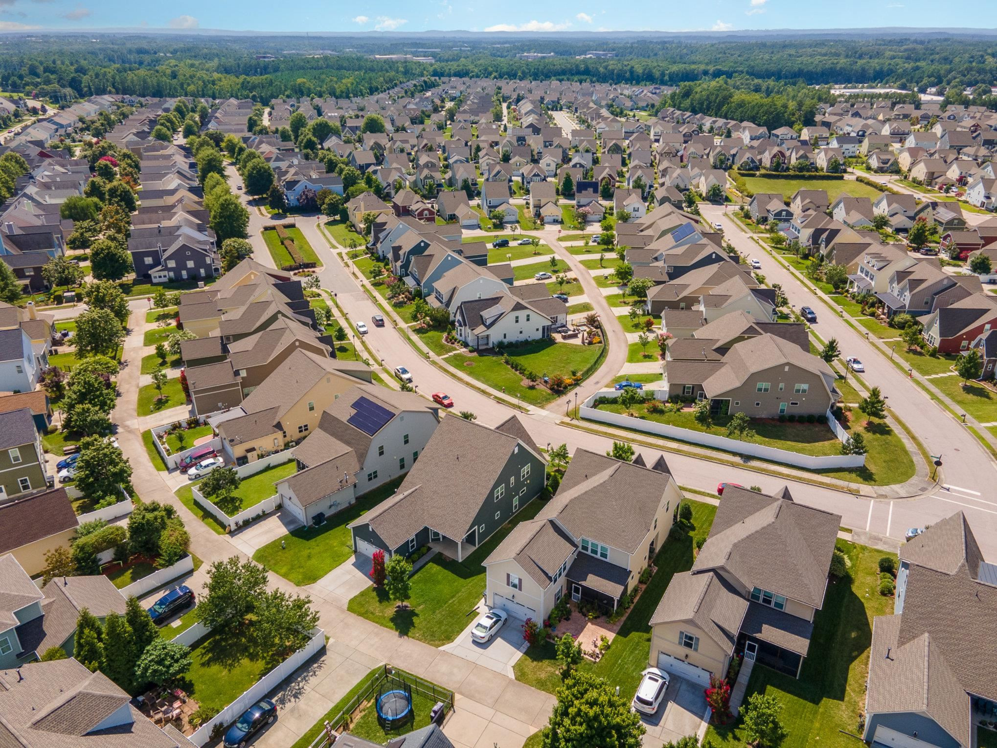 1213 Hemby Ridge Lane Morrisville, NC 27560 - Photo 4 of 60 an aerial view of residential houses with outdoor space