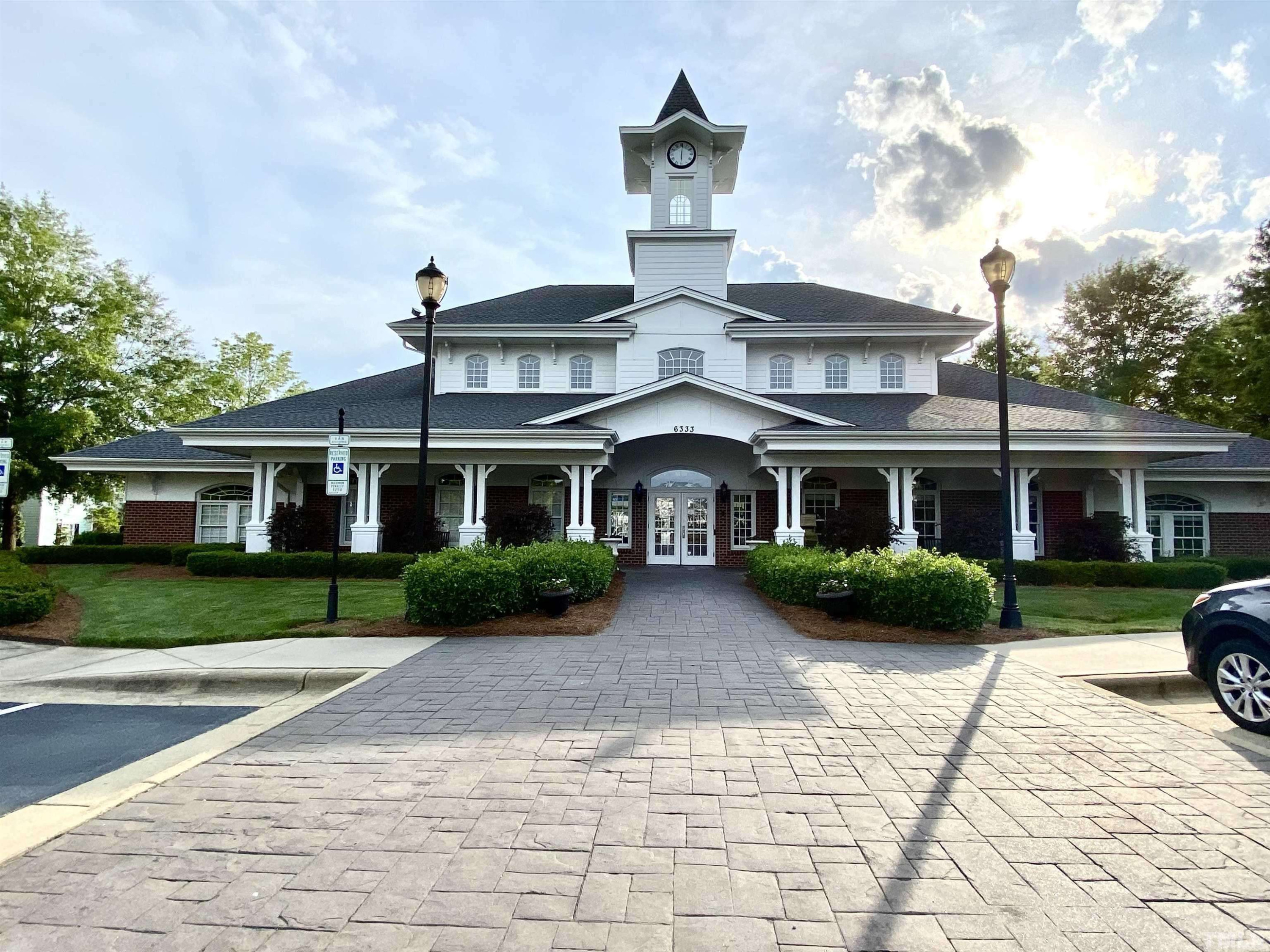 1213 Hemby Ridge Lane Morrisville, NC 27560 - Photo 53 of 60 a front view of a house with garden