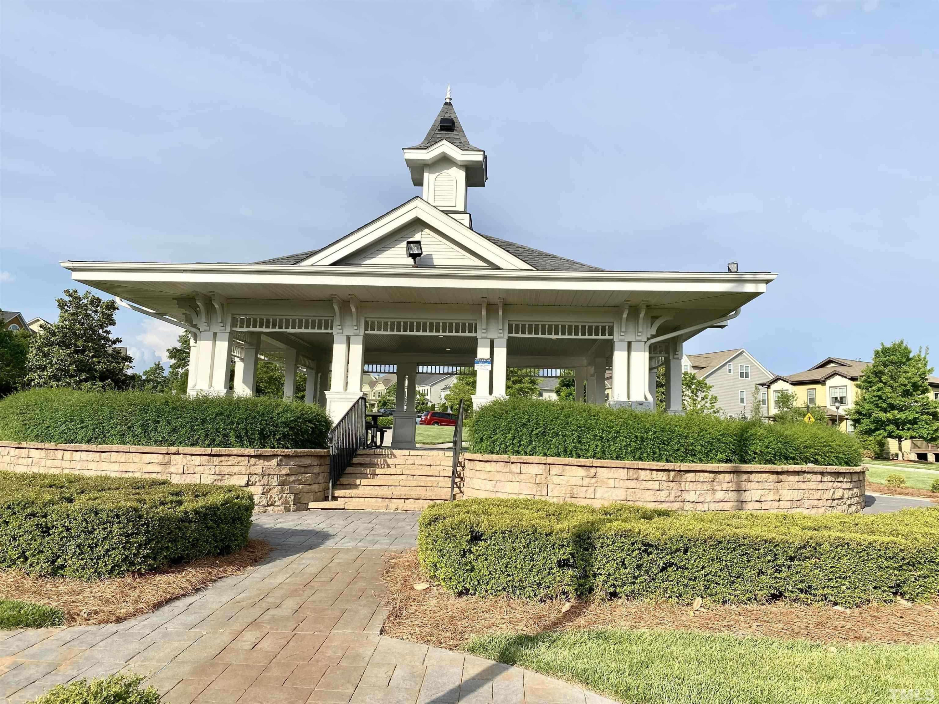 1213 Hemby Ridge Lane Morrisville, NC 27560 - Photo 56 of 60 a front view of a house with garden