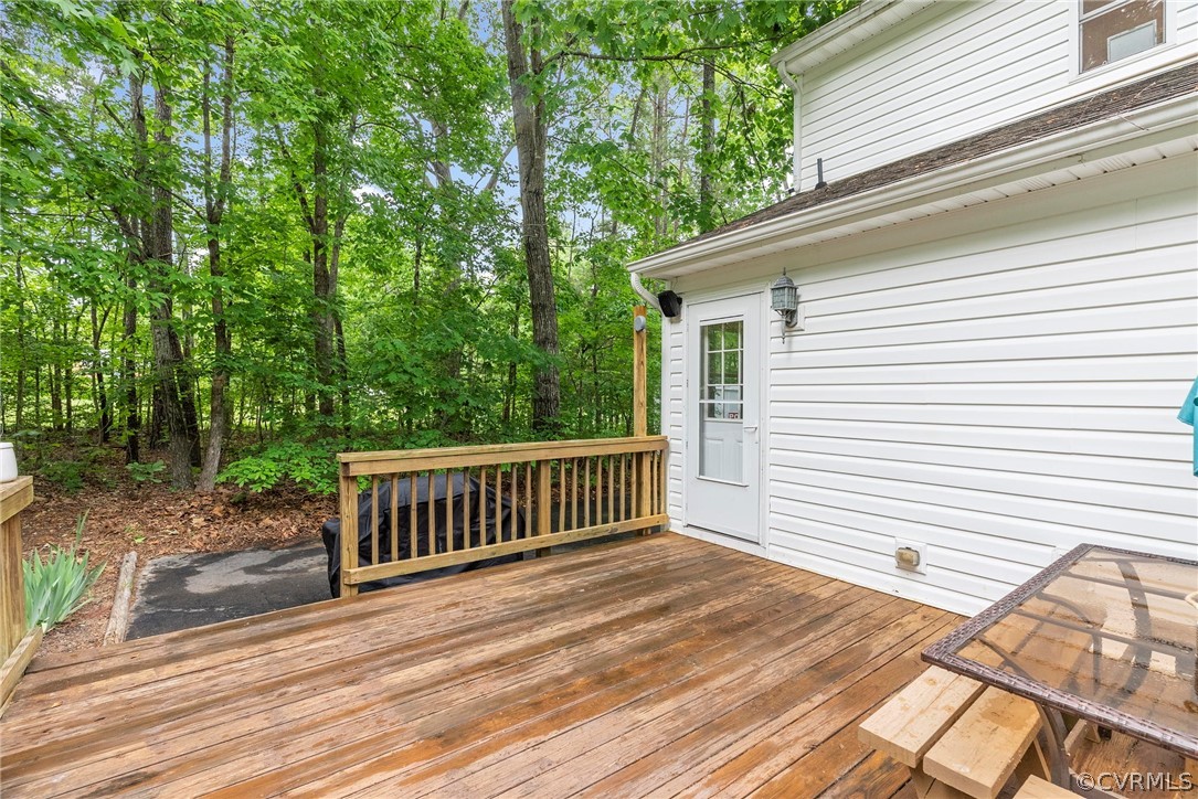 1775 Hawk Town Road Maidens, VA 23102 - Photo 24 of 27 a view of backyard with deck and garden