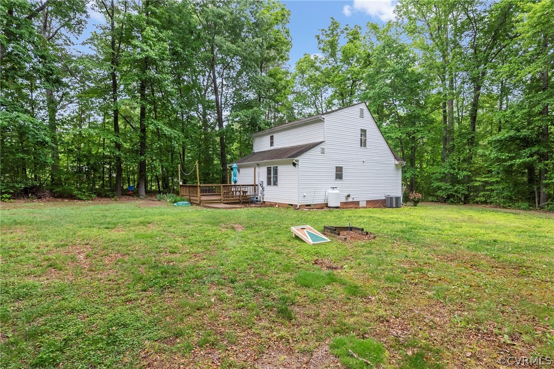 1775 Hawk Town Road Maidens, VA 23102 - Photo 25 of 27 a view of a backyard with large trees