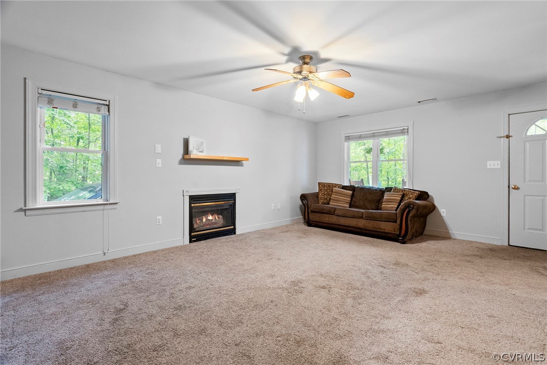1775 Hawk Town Road Maidens, VA 23102 - Photo 6 of 27 a living room with furniture and a fireplace