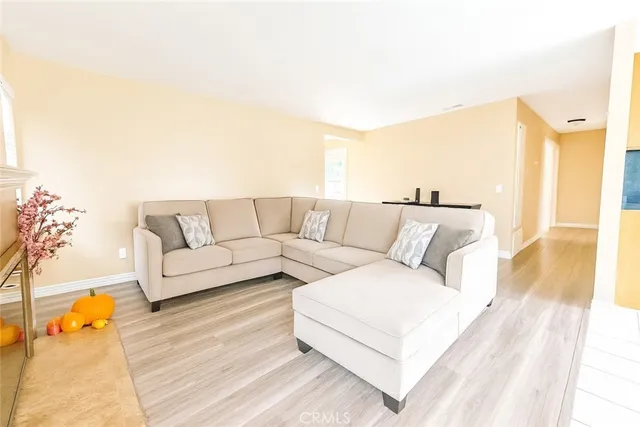 a living room with furniture and a couch