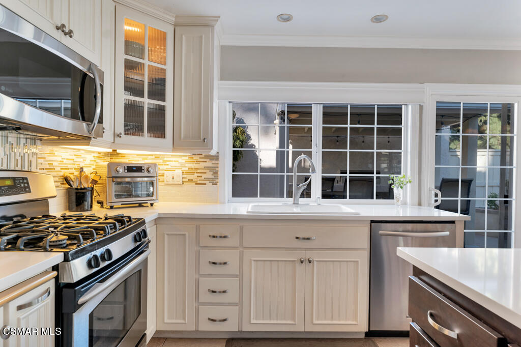 2932 Morningside Drive Thousand Oaks, CA 91362 - Photo 14 of 39 a kitchen with cabinets appliances and a window