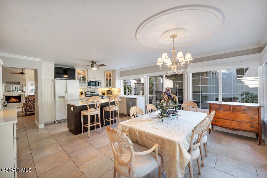 2932 Morningside Drive Thousand Oaks, CA 91362 - Photo 16 of 39 a view of a dining room with furniture and a chandelier