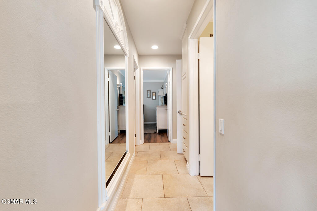 2932 Morningside Drive Thousand Oaks, CA 91362 - Photo 18 of 39 a view of a hallway with wooden shelves