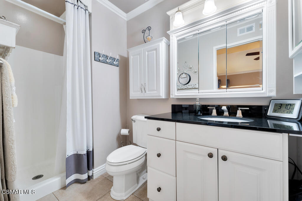 2932 Morningside Drive Thousand Oaks, CA 91362 - Photo 28 of 39 a bathroom with a sink a toilet and a mirror