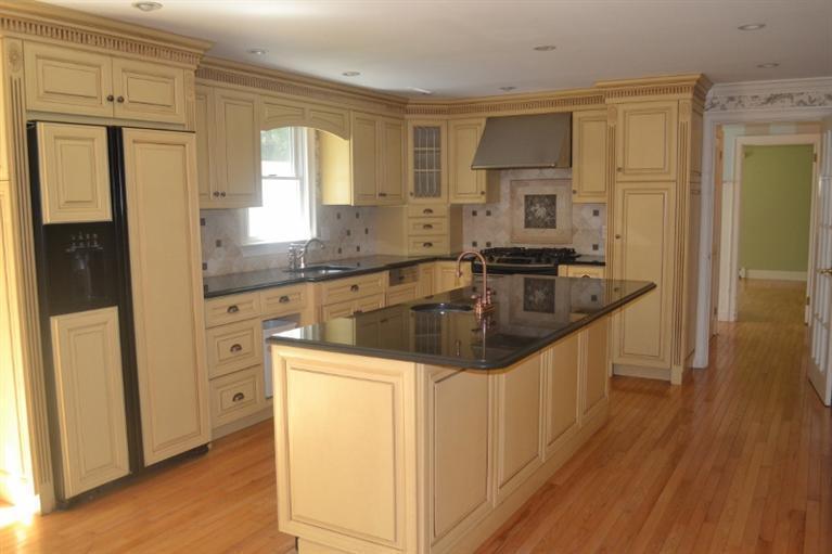 72 Rolling Hitch Road Centerville, MA 02632 - Photo 11 of 28 a kitchen with stainless steel appliances granite countertop a sink stove and refrigerator