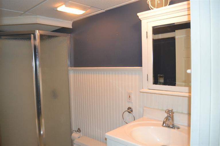 72 Rolling Hitch Road Centerville, MA 02632 - Photo 24 of 28 a bathroom with a sink a toilet and shower
