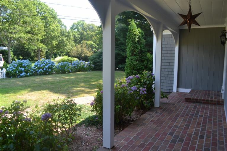 72 Rolling Hitch Road Centerville, MA 02632 - Photo 6 of 28 a view of a lake view with a garden