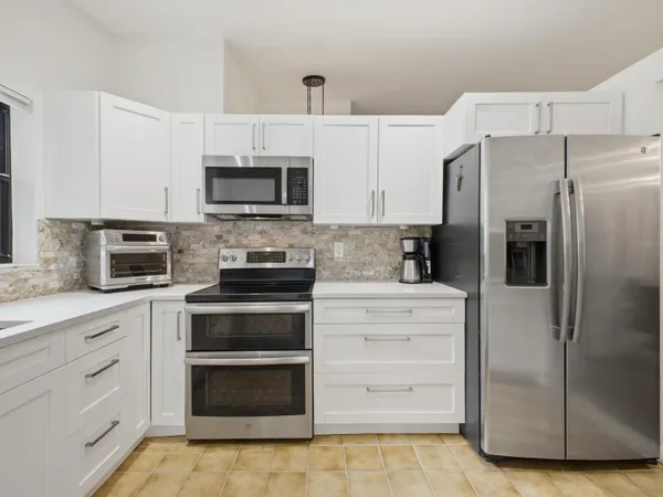 $445,000 | 56 Baytree Circle, Boynton Beach, FL 33436