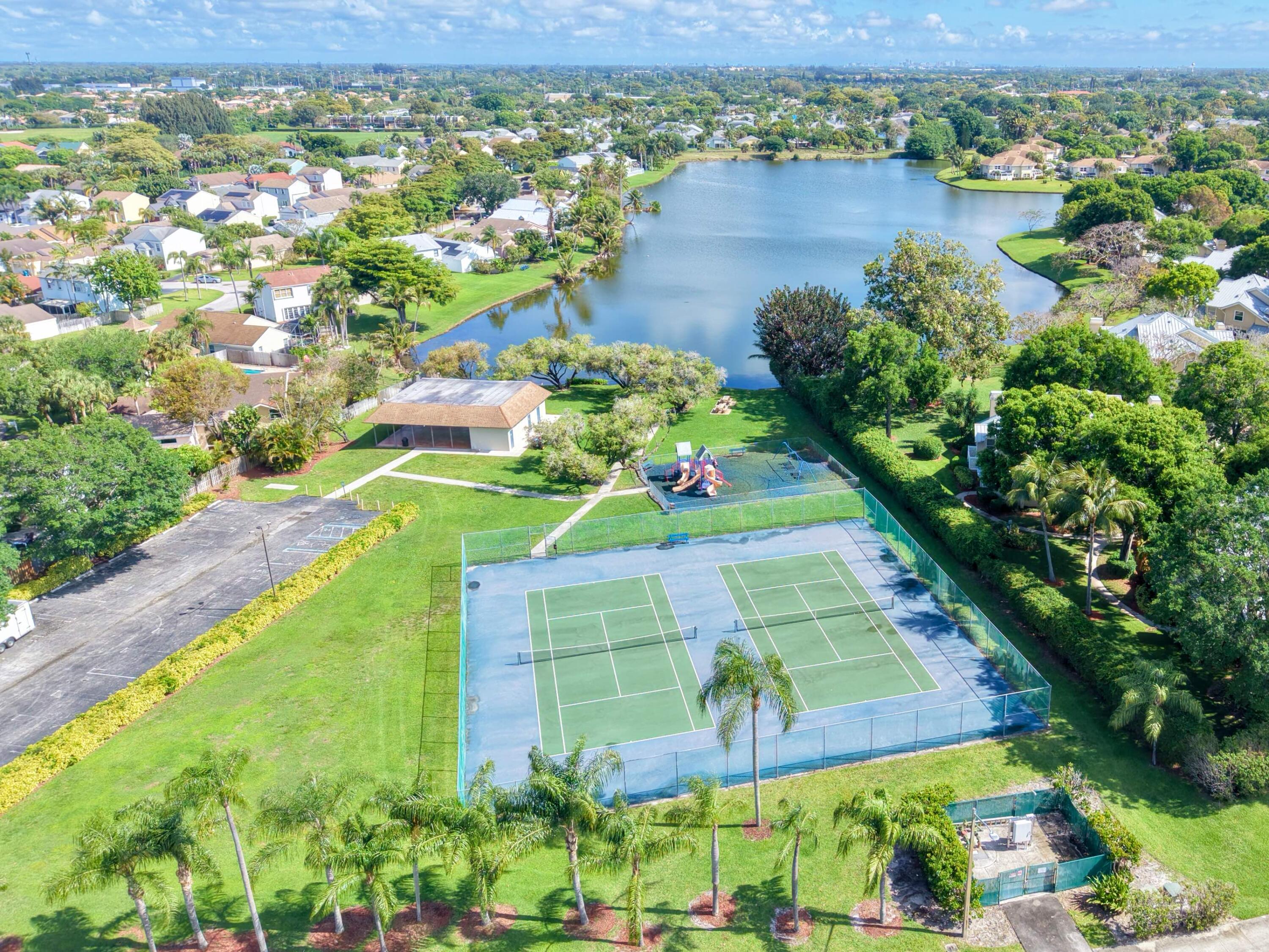 56 Baytree Circle Boynton Beach, FL 33436 - Photo 35 of 41 Community Playground Tennis Picnic