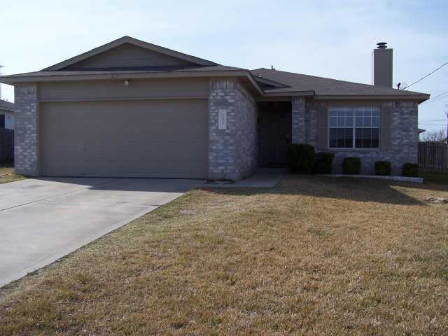 157 Spring Branch Drive Kyle, TX 78640 - Photo 1 of 1 a front view of a house with a yard