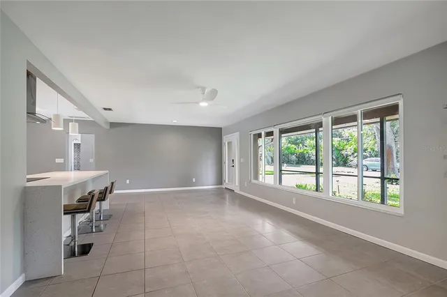 a kitchen with a sink stainless steel appliances and cabinets